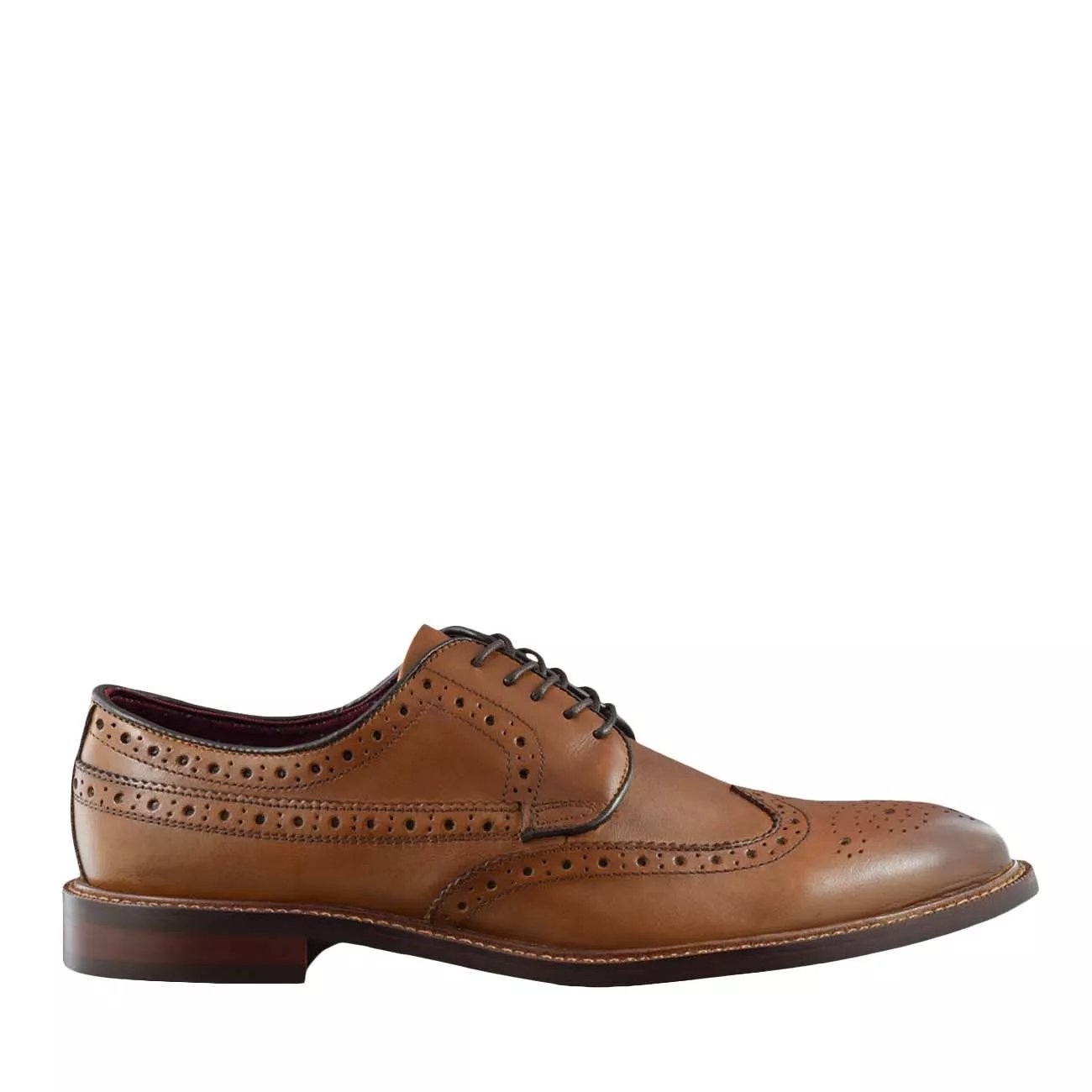 black and grey wingtip shoes